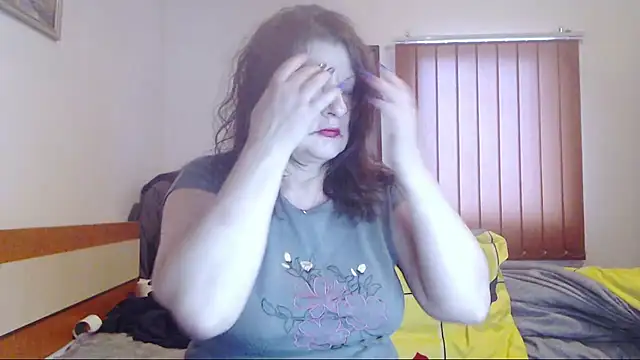 ExtasyMature live sex cam