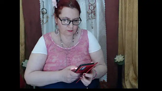 PlayfullMature live sex cam